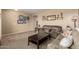 Spacious living room with large windows and comfortable seating at 20472 N 90Th Ln, Peoria, AZ 85382