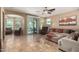 Living room with access to backyard and seating area at 20472 N 90Th Ln, Peoria, AZ 85382