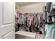 Spacious walk-in closet with ample shelving and hanging space at 20472 N 90Th Ln, Peoria, AZ 85382