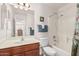 Clean bathroom with tub shower combo, vanity, and toilet at 2101 S Meridian Rd # 268, Apache Junction, AZ 85120