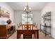 Dining room with a wood table, chandelier, and decorative shelving at 2101 S Meridian Rd # 268, Apache Junction, AZ 85120