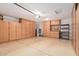 Organized garage with built-in cabinets and shelving at 2101 S Meridian Rd # 268, Apache Junction, AZ 85120