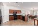 View of the kitchen showing an island and access to the dining area at 2101 S Meridian Rd # 268, Apache Junction, AZ 85120