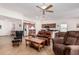 Spacious living room with leather furniture and a view into the kitchen at 2101 S Meridian Rd # 268, Apache Junction, AZ 85120