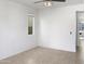 Empty dining room with neutral walls and tile flooring at 26520 N 132Nd Ln, Peoria, AZ 85383