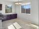Bright dining area with large windows and tile floors at 26520 N 132Nd Ln, Peoria, AZ 85383