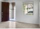 Entryway with tile floors and view of the front porch at 26520 N 132Nd Ln, Peoria, AZ 85383