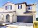 Two story home with a two-car garage and landscaping at 26520 N 132Nd Ln, Peoria, AZ 85383