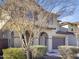 Two story home with a two-car garage and landscaping at 26520 N 132Nd Ln, Peoria, AZ 85383