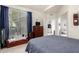 Bedroom with sliding door closet and view to living room at 2929 W Yorkshire Dr # 1060, Phoenix, AZ 85027