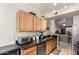 Well-equipped kitchen, granite counters, wood cabinets at 2929 W Yorkshire Dr # 1060, Phoenix, AZ 85027