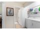 Convenient laundry room with washer, dryer, and shelving at 2929 W Yorkshire Dr # 1060, Phoenix, AZ 85027