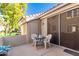 Small, private patio with table and chairs at 2929 W Yorkshire Dr # 1060, Phoenix, AZ 85027