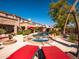 Relaxing pool and spa area with red lounge chairs at 32009 N 19Th Ln, Phoenix, AZ 85085