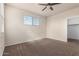 Spacious bedroom with closet and window with blinds at 3641 N 309Th Dr, Buckeye, AZ 85396