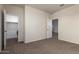 Spacious bedroom with closet and neutral wall colors at 3641 N 309Th Dr, Buckeye, AZ 85396