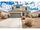 Two-story house with a brown garage door and landscaping at 3641 N 309Th Dr, Buckeye, AZ 85396