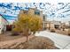 Two-story house with a tree in front at 3641 N 309Th Dr, Buckeye, AZ 85396