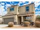 Two-story house with a two-car garage and landscaping at 3641 N 309Th Dr, Buckeye, AZ 85396