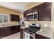Modern kitchen with stainless steel appliances at 3641 N 309Th Dr, Buckeye, AZ 85396