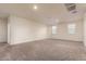 Spacious loft area with neutral carpet at 3641 N 309Th Dr, Buckeye, AZ 85396
