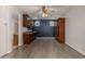 Basement kitchenette with dark wood cabinets and a mini-fridge at 3731 E Halifax Cir, Mesa, AZ 85205