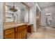 Bathroom features granite vanity and walk-in closet at 3731 E Halifax Cir, Mesa, AZ 85205