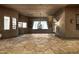 Spacious covered patio with flagstone floor and views to the backyard at 3731 E Halifax Cir, Mesa, AZ 85205