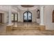 Spacious entryway with high ceilings, a chandelier, and a stunning floor at 3731 E Halifax Cir, Mesa, AZ 85205
