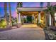 Covered entryway with stone columns, creating an inviting entrance at 3731 E Halifax Cir, Mesa, AZ 85205