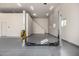 Garage with car lift and ample space for workshop at 3731 E Halifax Cir, Mesa, AZ 85205