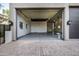 Garage with additional storage and extra wide door at 3731 E Halifax Cir, Mesa, AZ 85205
