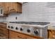 Stainless steel gas cooktop with ample burners at 3731 E Halifax Cir, Mesa, AZ 85205