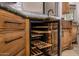 Wine cooler built into kitchen cabinetry at 3731 E Halifax Cir, Mesa, AZ 85205