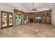 Spacious living room features a fireplace and built-in entertainment center at 3731 E Halifax Cir, Mesa, AZ 85205