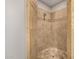 A walk-in shower with beige tile and a single shower head at 3731 E Halifax Cir, Mesa, AZ 85205