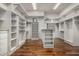 Spacious walk-in closet with ample shelving and drawers at 3731 E Halifax Cir, Mesa, AZ 85205