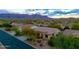 Single-story home with a landscaped yard and mountain views at 4119 S Las Villa Way, Gold Canyon, AZ 85118
