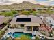 Solar-paneled home with a large backyard, private pool, and mountain views at 4119 S Las Villa Way, Gold Canyon, AZ 85118