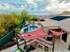 Relaxing backyard with a large pool, spa, and shaded patio area at 4119 S Las Villa Way, Gold Canyon, AZ 85118