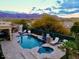 Spacious backyard with a private pool and spa, perfect for outdoor entertaining at 4119 S Las Villa Way, Gold Canyon, AZ 85118