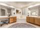 Large bathroom with dual vanities, a soaking tub, and lots of storage at 4119 S Las Villa Way, Gold Canyon, AZ 85118