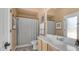 Cozy bathroom with neutral tones, framed mirror and vanity with sink at 4119 S Las Villa Way, Gold Canyon, AZ 85118