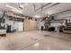 Large garage with plenty of storage and shelving at 4119 S Las Villa Way, Gold Canyon, AZ 85118
