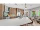 Gourmet kitchen with large island, quartz countertops, stainless steel appliances and backsplash at 4119 S Las Villa Way, Gold Canyon, AZ 85118