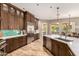 Spacious kitchen with a large island, stainless steel appliances, and plenty of counter space at 4119 S Las Villa Way, Gold Canyon, AZ 85118