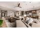 Expansive living room featuring an open floor plan, cozy seating, and modern finishes at 4119 S Las Villa Way, Gold Canyon, AZ 85118