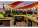 Well-appointed outdoor kitchen features ample counter space, a built-in grill, and convenient storage for entertaining at 4119 S Las Villa Way, Gold Canyon, AZ 85118