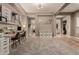 Spacious playroom with neutral colors, stylish decor, large windows and door frames, and carpeted floors at 4119 S Las Villa Way, Gold Canyon, AZ 85118