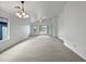 Spacious living area with access to the backyard and lots of natural light at 41876 W Corvalis Ln, Maricopa, AZ 85138